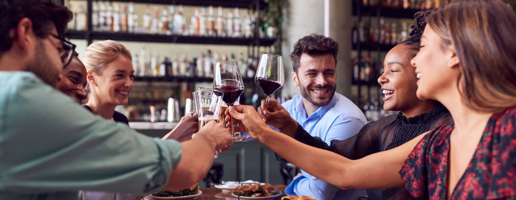 friends laughing and having drinks