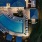 Resort-style swimming pool with lounge seating