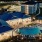 Resort-style swimming pool with lounge seating